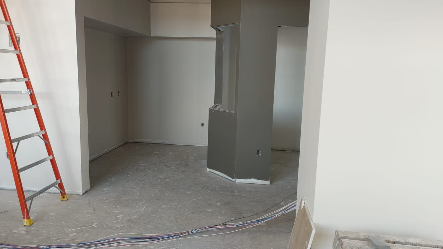 Finished painted interior room with services roughed in