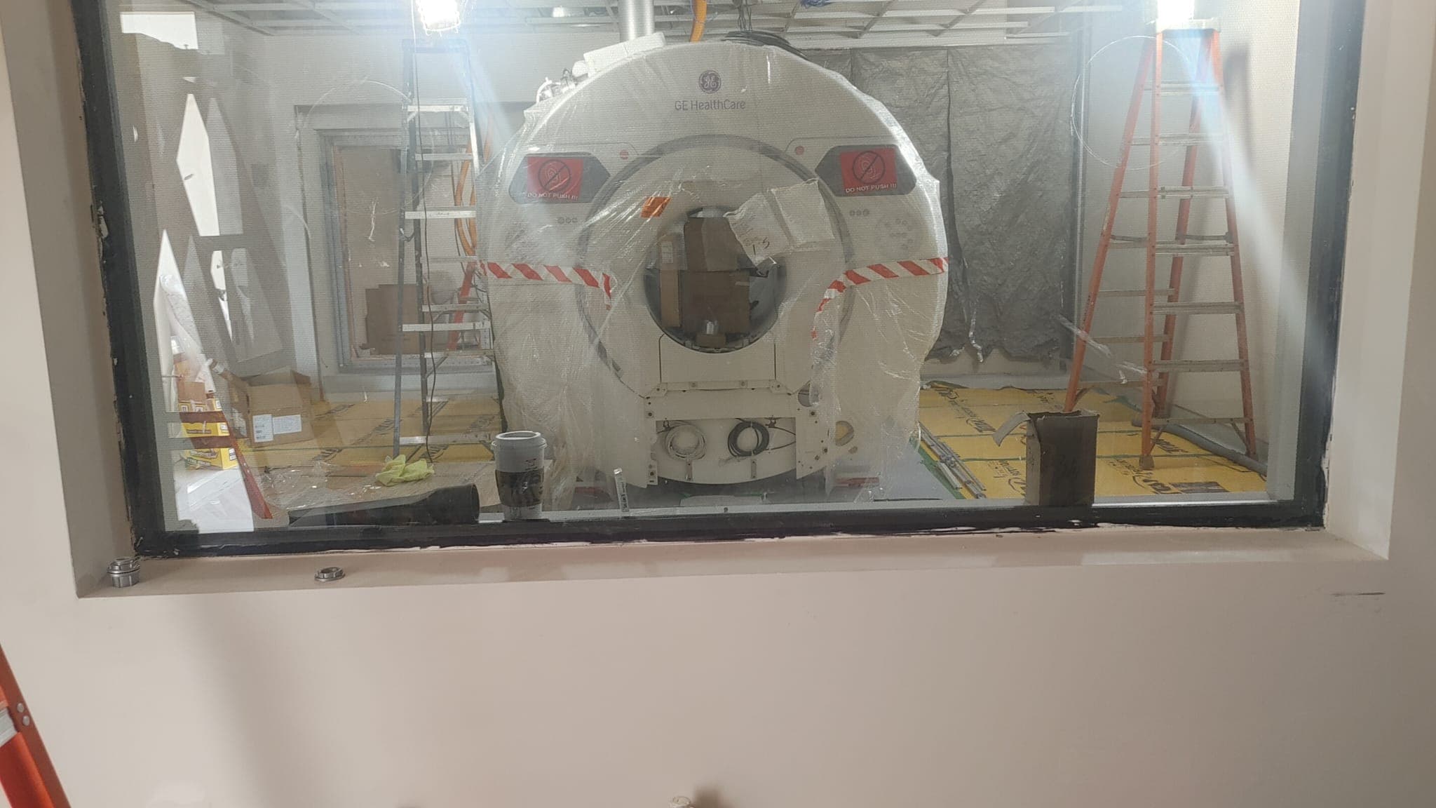 View through the control-room window at the newly placed MRI scanner
