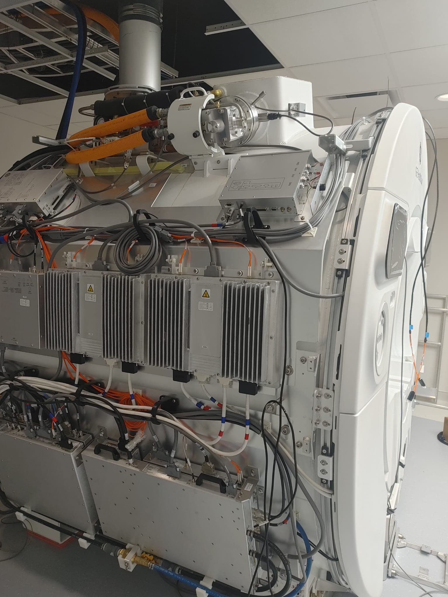 Interior of the MRI magnet during installation showing cold head and gradient electronics