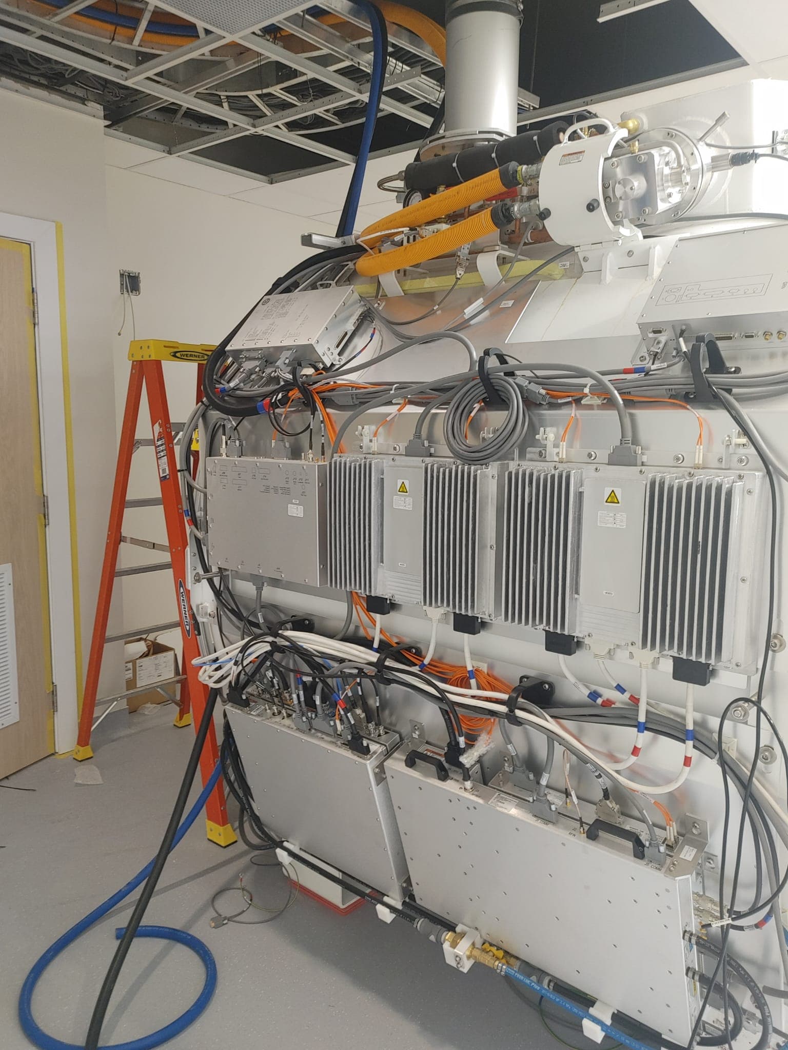 MRI service access open showing cryogenic and electronic assemblies